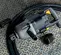 Herramienta de impacto neumático con zócalo de 1 1/2 pulgadas Ingersoll Rand plateada y negra sobre un piso de metal