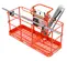 Top angled view of an orange Skyjack scissor lift basket with control panel and safety railings.