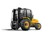 Front angled view of yellow JCB rough terrain forklift with black forks, black tires and an enclosed cabin.