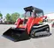 Cargador sobre orugas compacto Takeuchi rojo