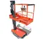 Side view of an orange Skyjack electric scissor lift with guardrails in a lowered position.