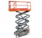 Side angled view of an orange and gray scissor lift, partially extended with safety railing.