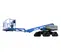 Side view of blue Genie boom lift with extended arm and platform lowered near the ground.