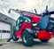 Red and black Magni variable reach forklift