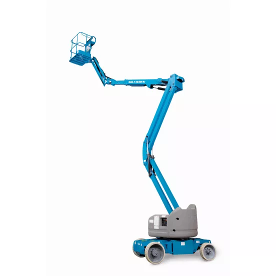 Side view of a partially extended blue articulating boom lift with narrow basket.