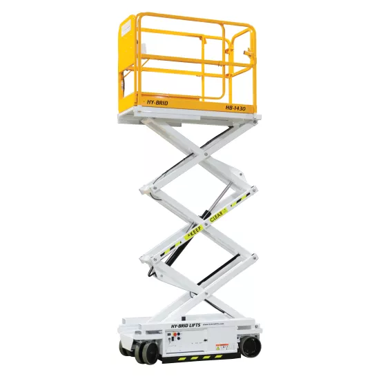 Side view of yellow and white scissor lift in a partially extended position with safety rails and compact base.